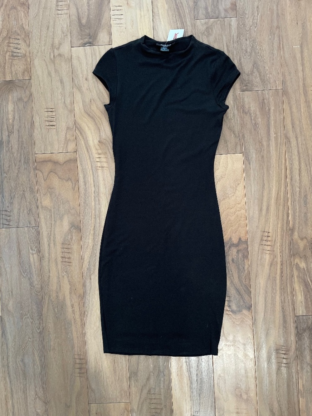 Form-Fitting, Knee-Length Capsleeve Black Dress